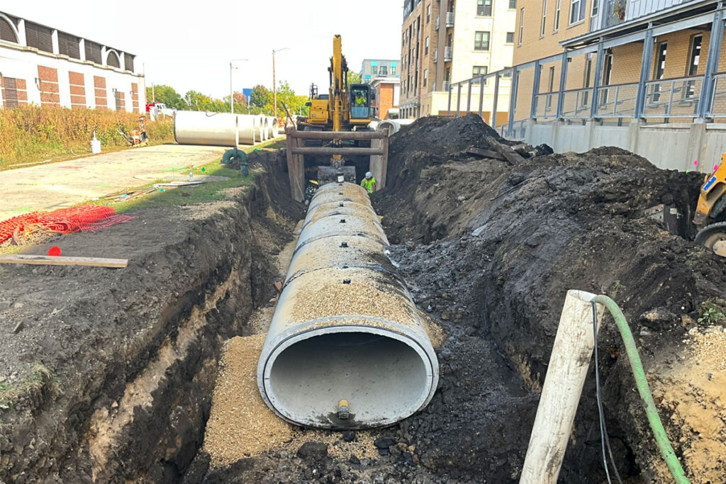large pipe installation in trench